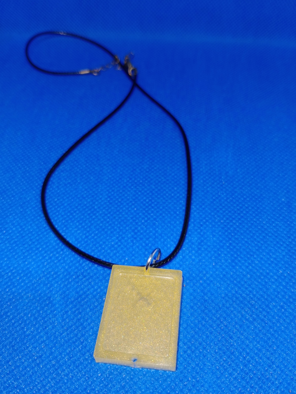 Yellow Rectangular Resin Pendant Necklace on Black Cord